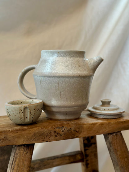 Antique white revolve teapot